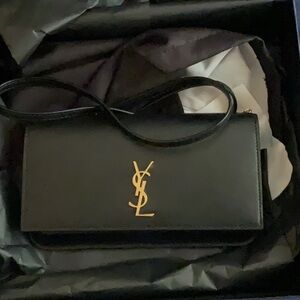 Yves Saint Laurent Black and Gold Leather Clutch